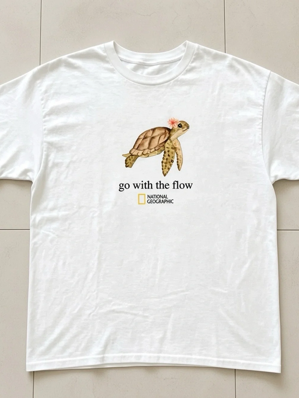 National Geographic “Go with the flow” White T-shirt